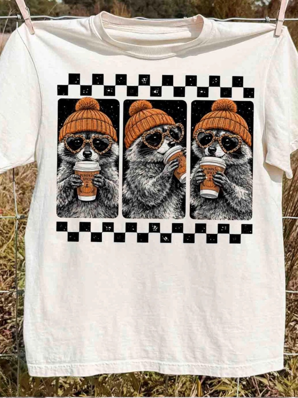 White Tee with Orange-Beanie Raccoon Trio Graphic